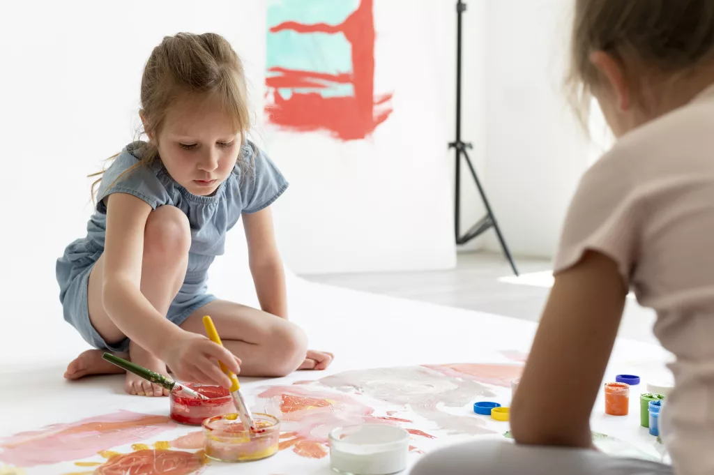 close-up-kids-painting-together-inside